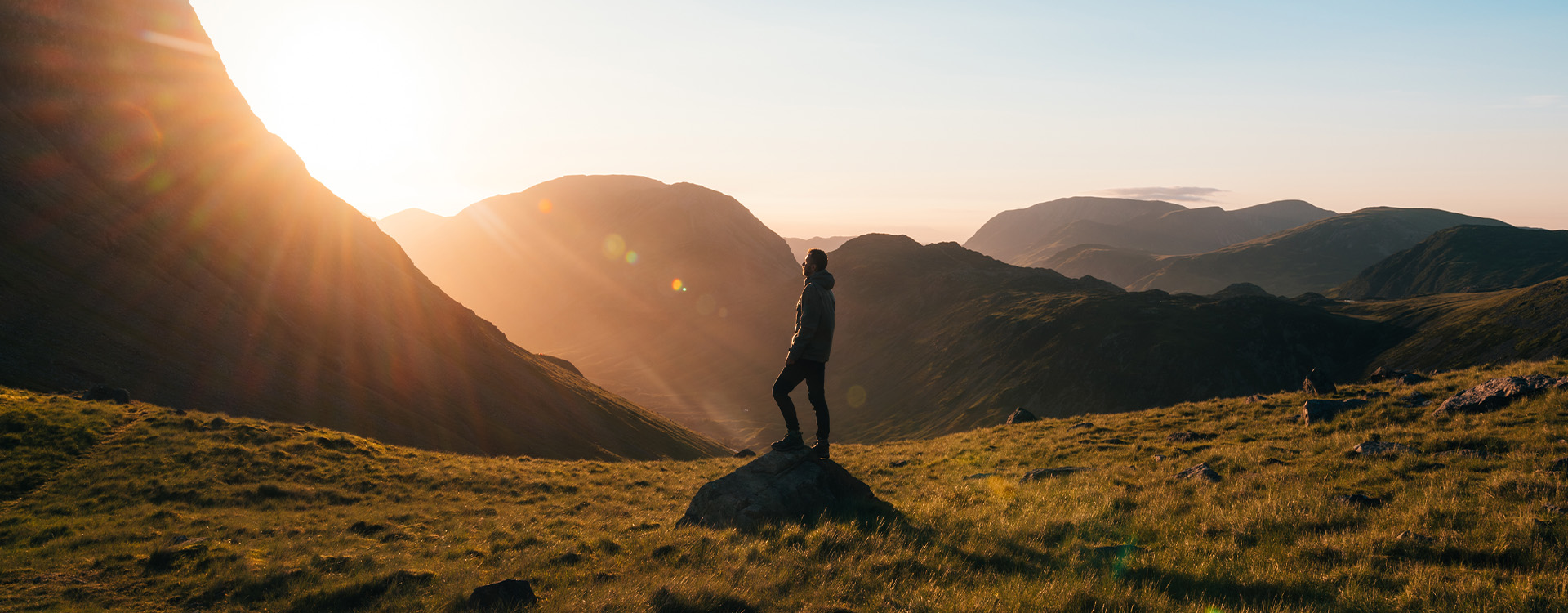 DexShell outdoor story image showing a person standing in mountain conditions