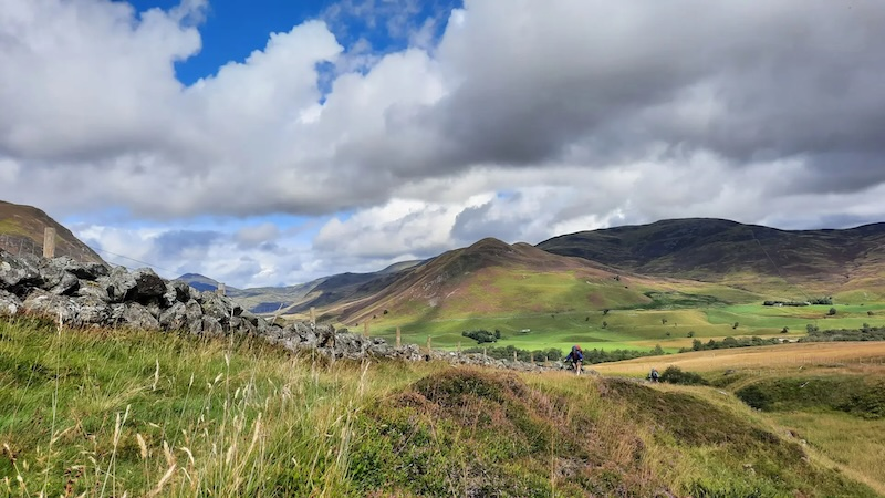 Riders traversing remote gravel tracks and historic landscapes through the Cateran Ecomuseum